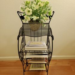 Flower or Magazine stand

Steel stand with multiple use.