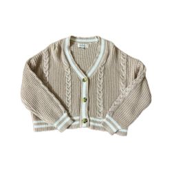 pink cableknit sweater