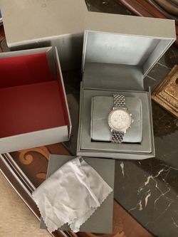 Round Michele watch, diamonds all around and inside