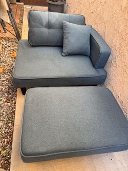 Blue arm chair and ottoman comes with pillows