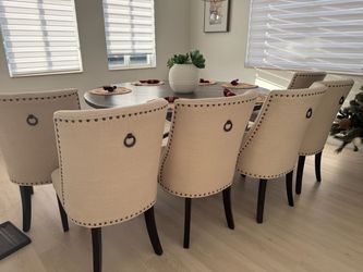 Beige Upholstered Dining Chair with Nailhead Trim