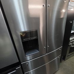 WHIRLPOOL 4 DOOR STAINLESS STEEL REFRIGERATOR