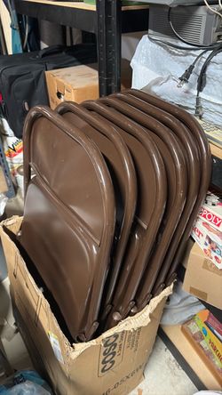6 folding chairs. Used.