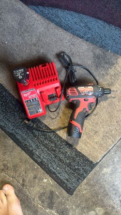 M12 Drill With 2 Batteries And A Dual Charger