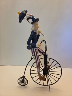 Uncle Sam Penny-Farthing Bicycle Figurine