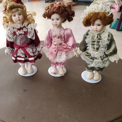 11-5" Tall Porcelain Dolls On Stands $5 Each 