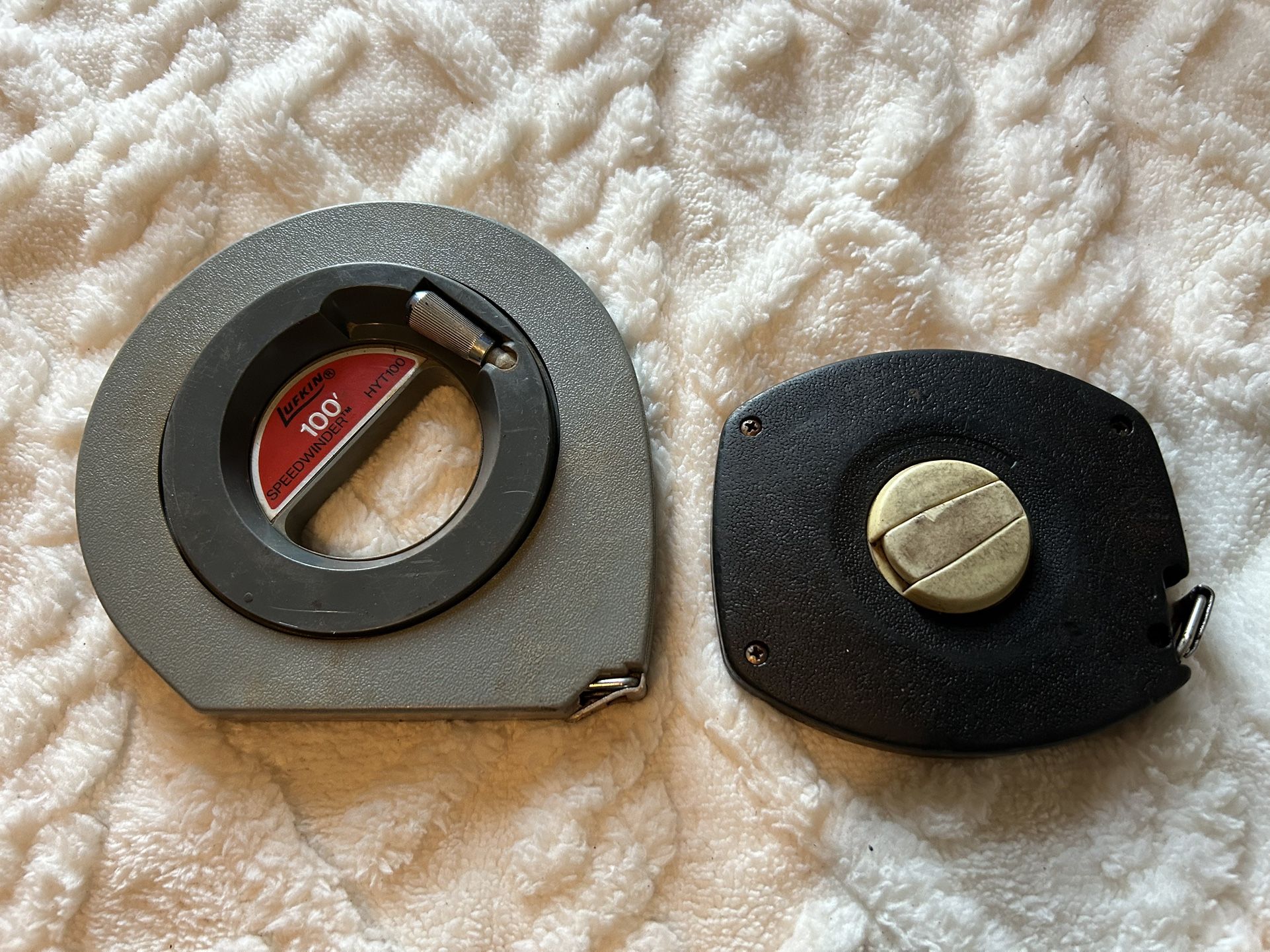 2 100’ TAPE MEASURES