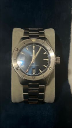 Nodus Retrospect II 42mm automatic dive watch with a blue dial and steel bracelet