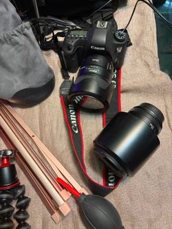 The Canon EOS 6D PROFESSIONAL is a compact full-frame DSLR, ideal for those looking to upgrade from APS-C to full-frame cameras. It is renowned for it