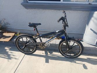 Boy's 20" mongoose rebel bmx bike with mag wheels