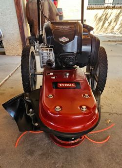 Selling A Toro walk behind trimmer in excellant Running condition Make A Reasonable offer