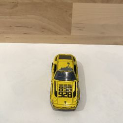 Vintage 1983 Porsche 928 Hong Kong Rally Yellow 1:64 Diecast Car