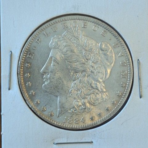 Silver Antique Collectible Morgan dollar dated 1884. MS+ BU Brilliant Uncirculated gorgeous condition. Purchased from Northern Nevada Coin Shop
