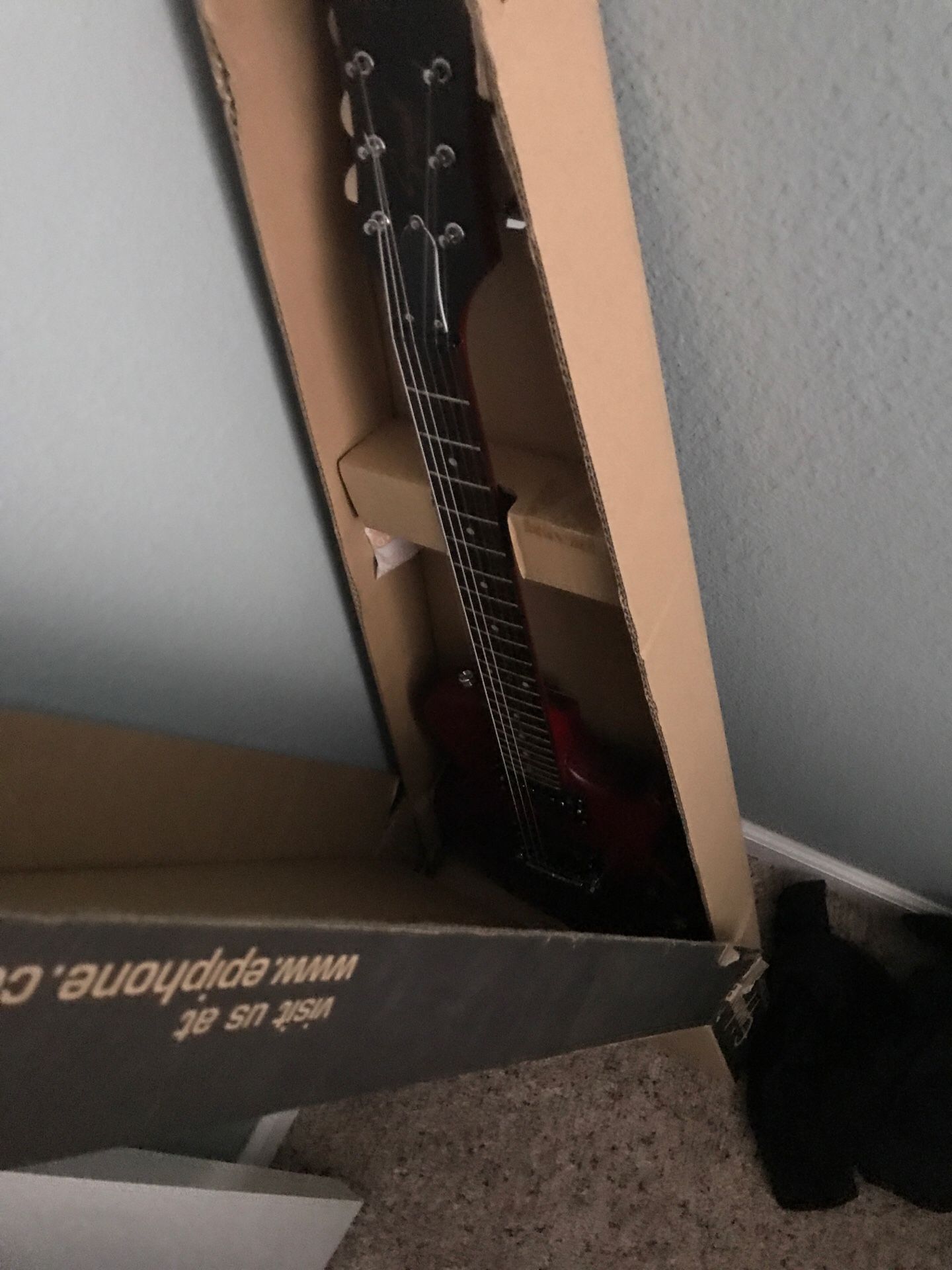 Epiphone guitar and Mini twin amp