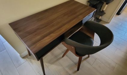 Clean office/school desk with a chair