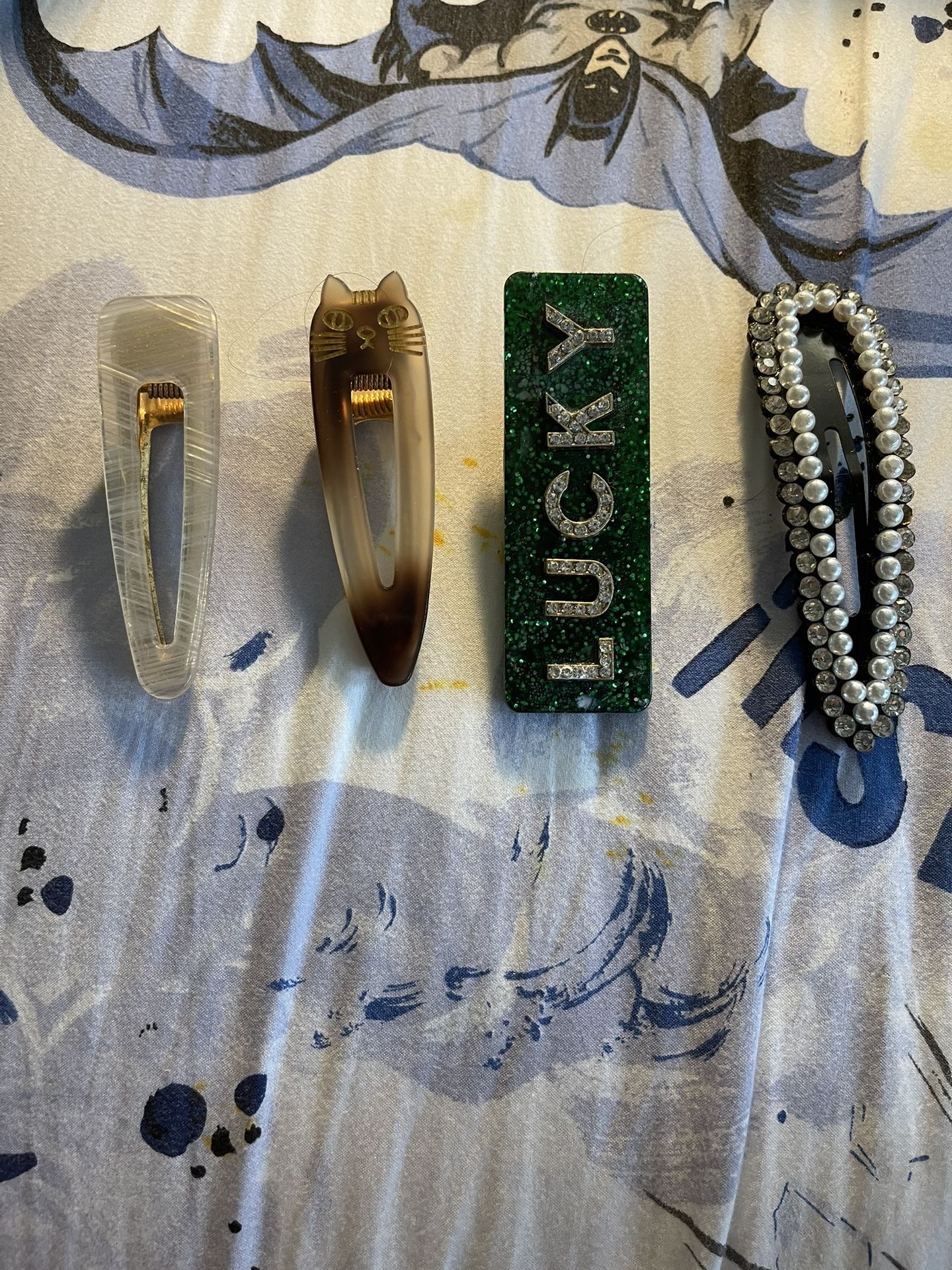 Four Pairs Of Hair Clips