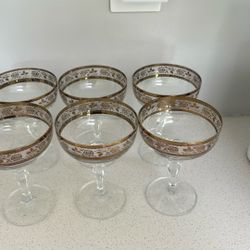 A Set Of Six Crystal Champagne, Glasses With Gold Roses, And Brim