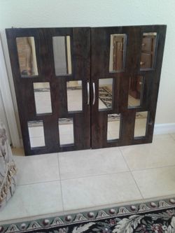 A set of Brand New decorative solid dark wood mirrors