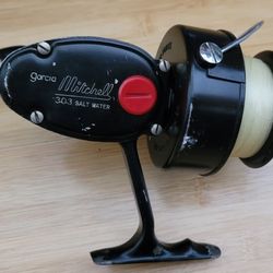 Vintage Garcia Mitchell 303 Spinning Reel