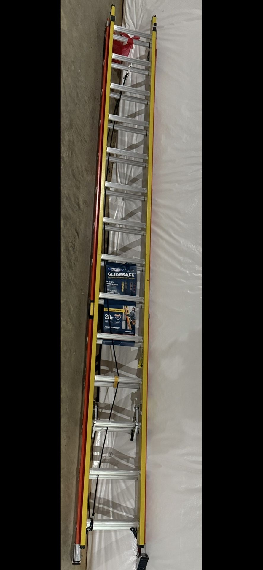 Werner Glidesafe 28-ft (27-ft Reach Height ) Fiberglass Type 1A - 300 lbs. Load Capacity Extension Ladder