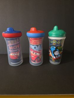 Boy's sipping cups