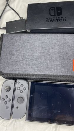Nintendo Switch - Gray + Gray Joy-Con