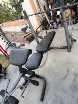 Very nice and strong Olympic weight bench with 7 ft Olympic bar. Weight plates available for sale as well