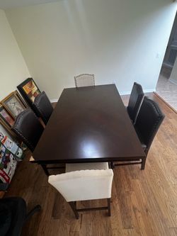 Dining Room Brown Wood Table And Six Chairs