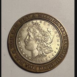 1889 Morgan Dollar Au+  Encased In A Buick Automobile Advertising