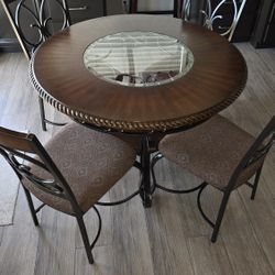 Kitchen/Dinning Table Set Sold By Ashley Furniture 