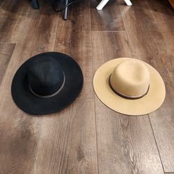 2 wide-brim wool felt hats, pinched crowns(left, men), contrasting leather bands resting on a wood-grain surface(right, women), great condition