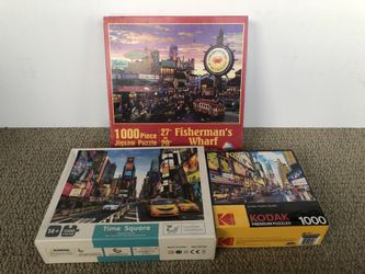 3 - 1,000 Piece Puzzles 2 - Time Square Theme, 1 - Fisherman’s Wharf Theme