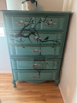 Turquoise tall dresser