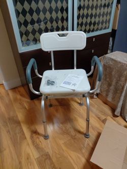 Brand new swivel shower chair