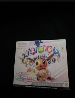 Prismatic Evolutions ETB. Has tear on the side please look at pics