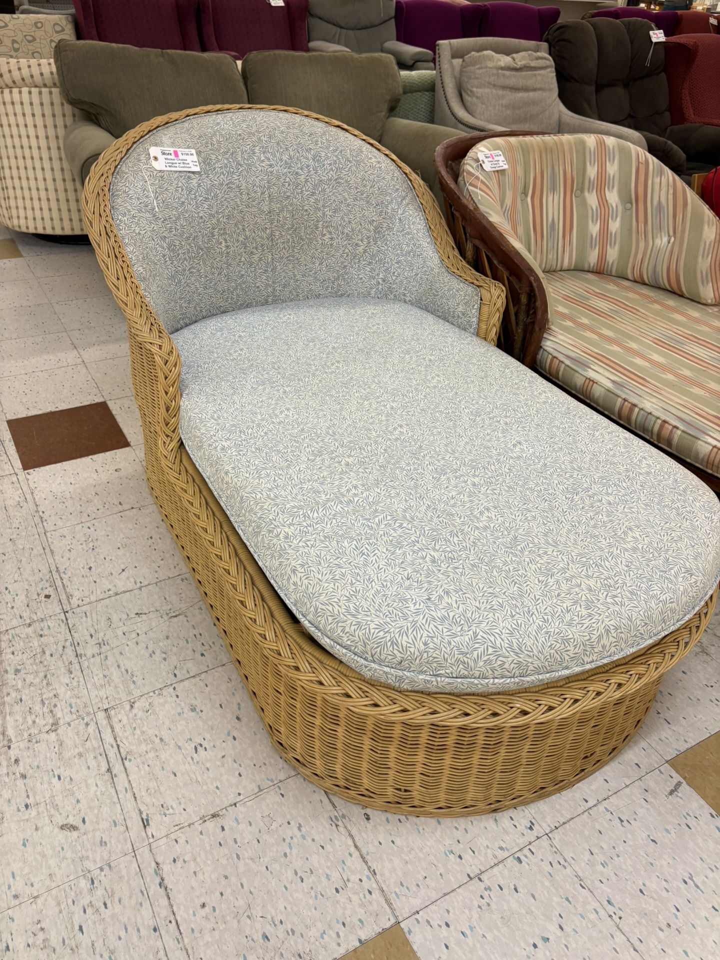 Wicker Chaise Lounge w/ Blue & Cream Patterned Cushion