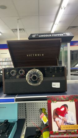VICTROLA RECORD PLAYER.