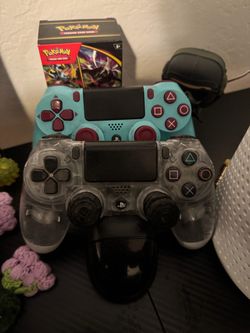 2 PS3 controllers + charger