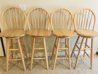 Brand new wooden swivel bar stool only $50ea