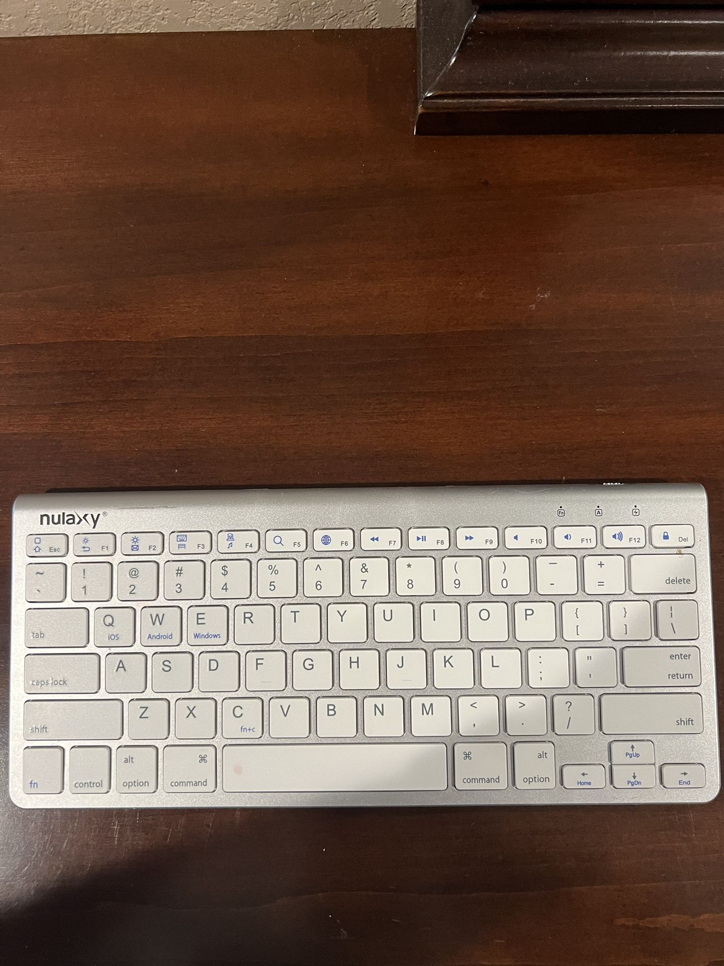 Nulaxy KM13 Wireless Bluetooth Keyboard with Sliding Stand