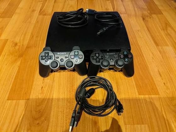 PS3 Slim With 2 Controllers & All Cords