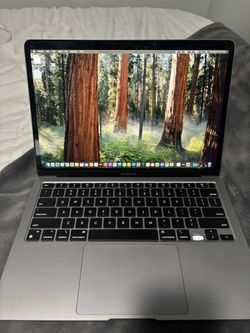 2020 MacBook Air (M1, 13.3″) — 8 GB RAM, 256 GB SSD — works fine, one key missing