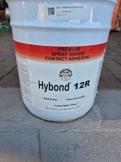 Half of bucket of HYBOND 2R // premium spray grade contac adhesive