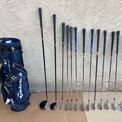 Assortment Of Right Handed Golf Clubs &
TaylorMade Micro Lite Bag