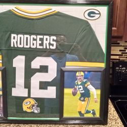 AARON RODGERS OF THE GREEN BAY PACKERS CUSTOM STITCHED FRAMED JERSEY.