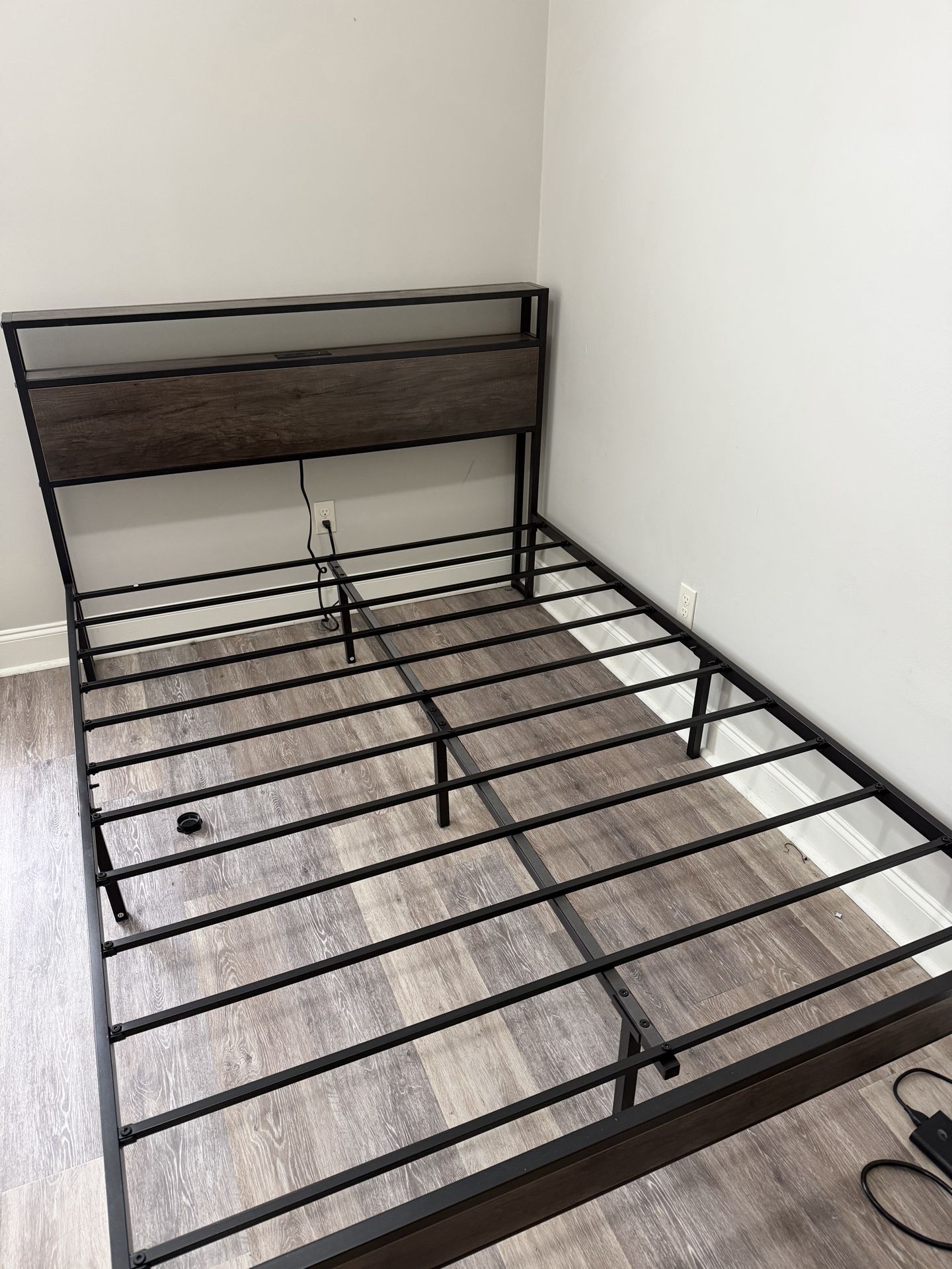 A bed with a mattress in good condition! (Queen size)