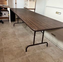 8‘ x 29 1/2“ table with fold up legs