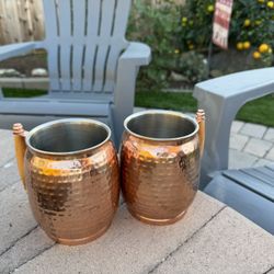 two hammered copper Moscow Mule mugs