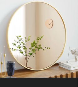 Gold circle mirror- target