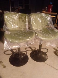 Two brand new bar stools